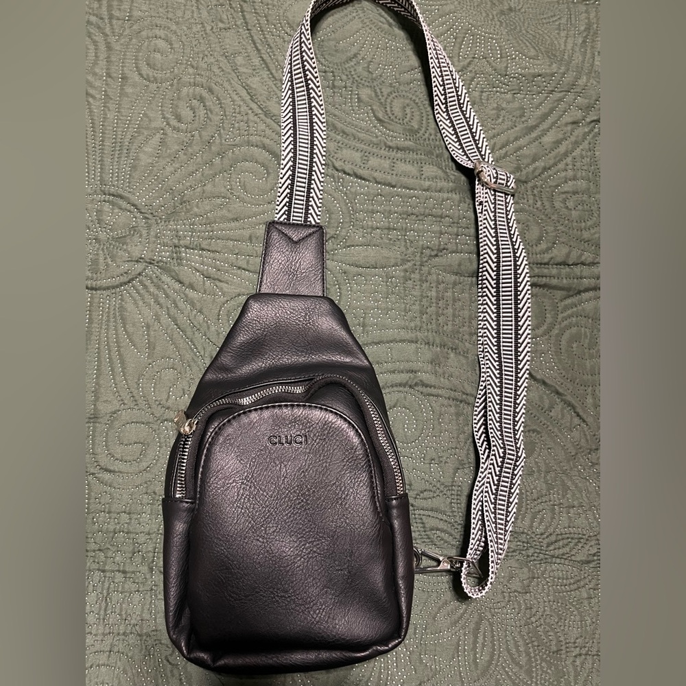 Chic Black Leather Backpack With Patterned Strap - image 1